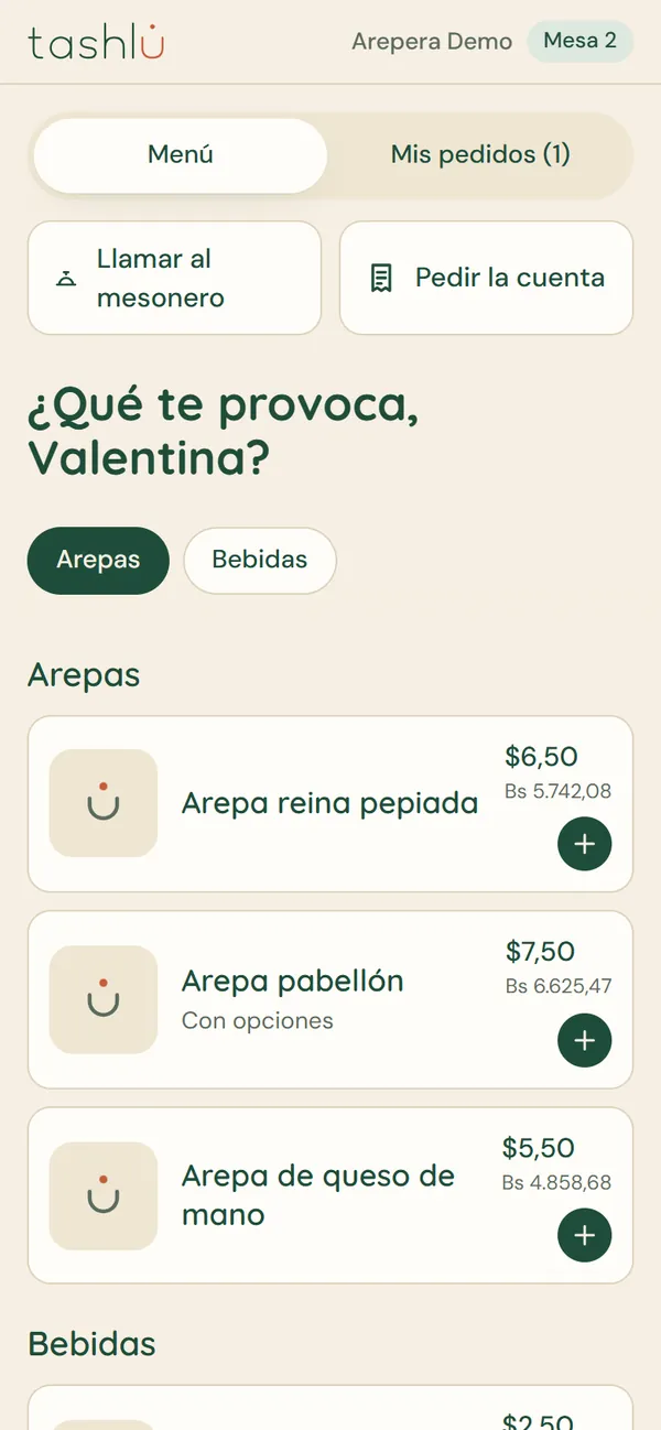 Menú de Tashlu en el teléfono de un cliente, con precios en dólares y bolívares